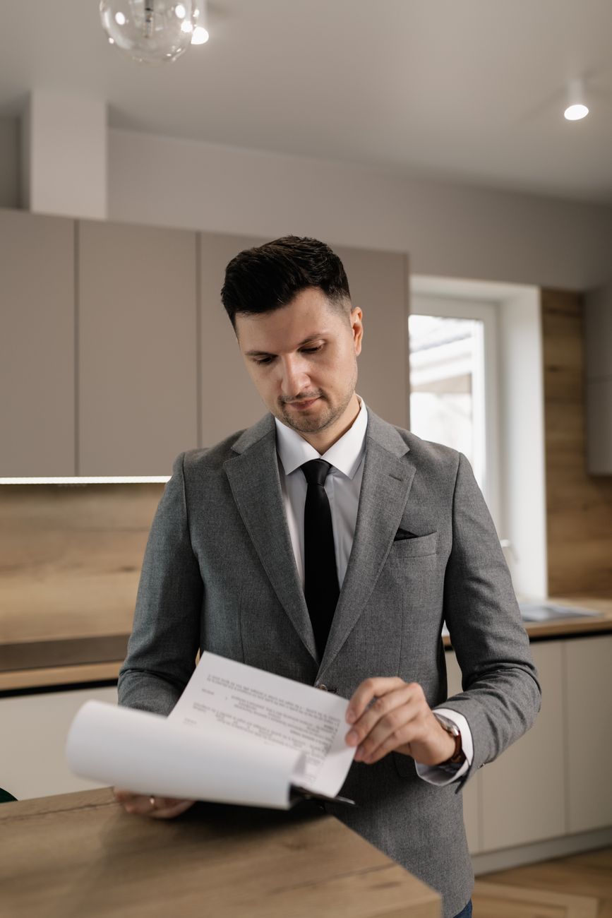 Real Estate specialist reviewing documents